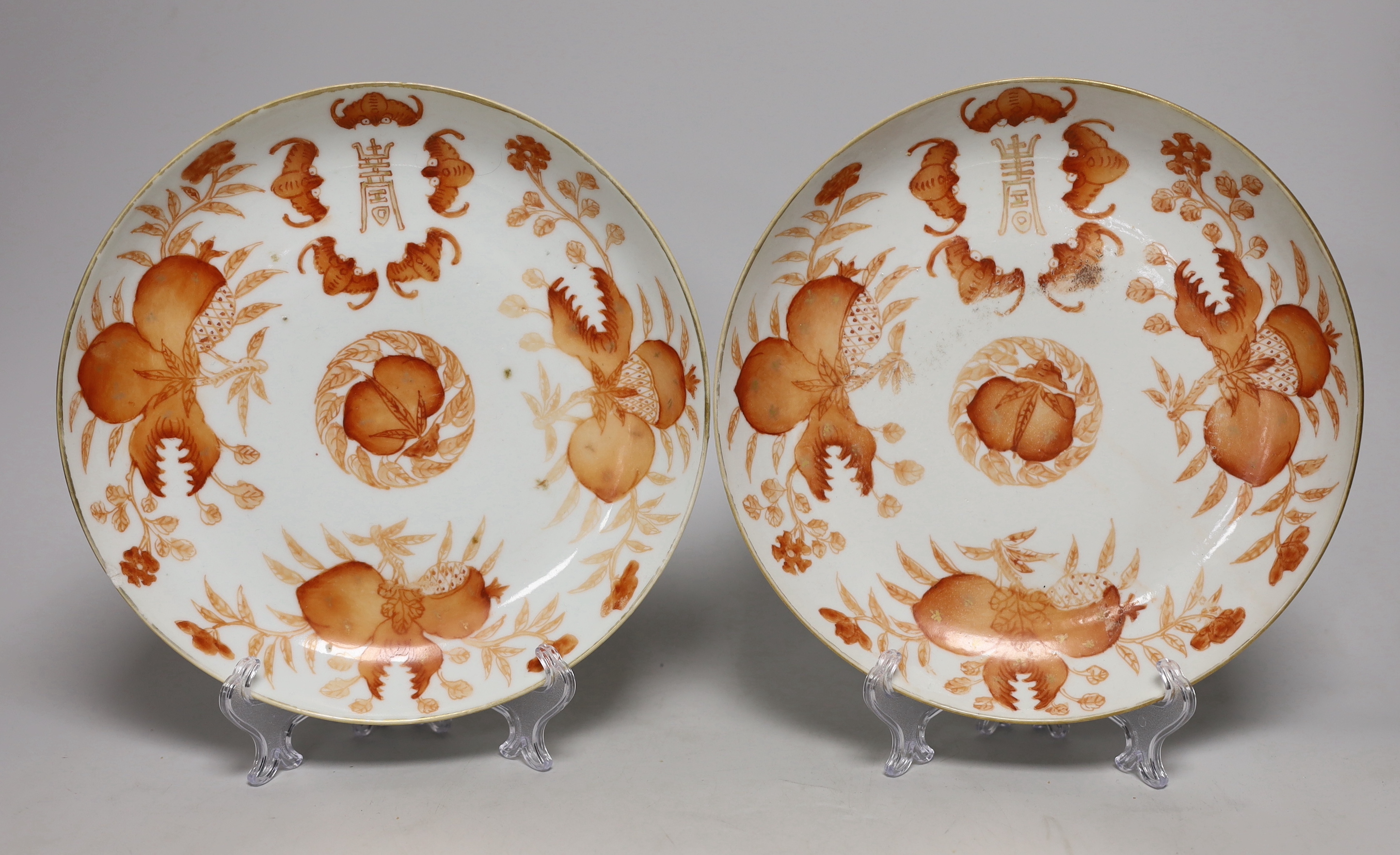 A pair of late 19th century Chinese iron red enamelled ‘sanduo’ dishes, Tongzhi marks, 23cm diameter